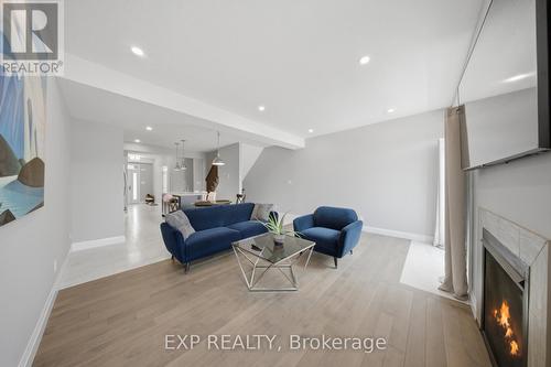 107 Stephenson Way, Minto, ON - Indoor Photo Showing Living Room With Fireplace