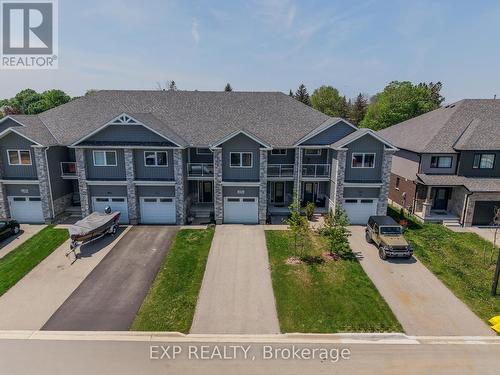 107 Stephenson Way, Minto, ON - Outdoor With Facade