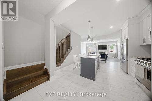 107 Stephenson Way, Minto, ON - Indoor Photo Showing Kitchen With Stainless Steel Kitchen
