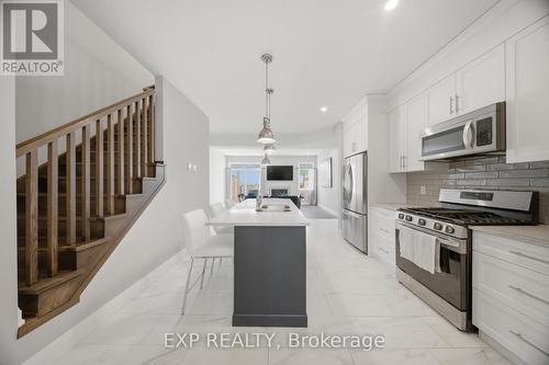 107 Stephenson Way, Minto, ON - Indoor Photo Showing Kitchen With Upgraded Kitchen