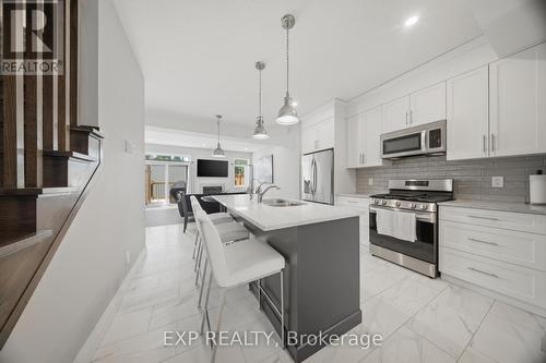 107 Stephenson Way, Minto, ON - Indoor Photo Showing Kitchen With Upgraded Kitchen