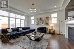 O/C great room with wall of windows and gas f/p - - 