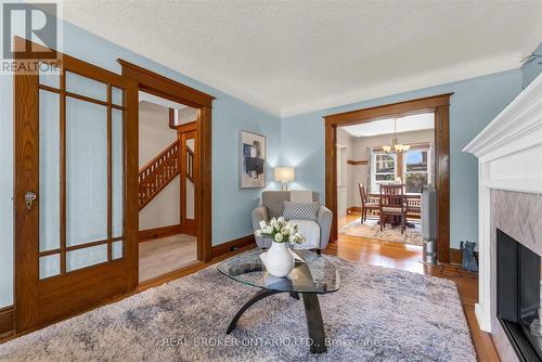 99 Tuxedo Avenue S, Hamilton, ON - Indoor Photo Showing Living Room With Fireplace