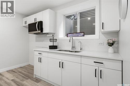 5121 Buckingham Drive E, Regina, SK - Indoor Photo Showing Kitchen With Double Sink