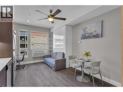 Complete with custom built-in Murphy bed, sofa, wall-mounted TV, desk, closet, and more - 