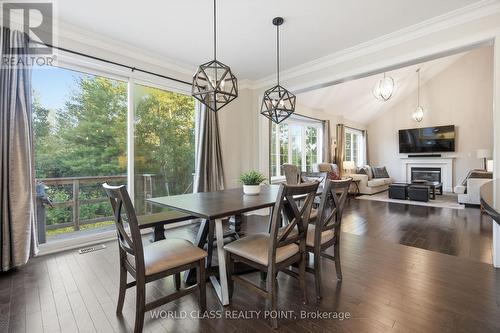 436 Cusick Circle, Milton, ON - Indoor Photo Showing Dining Room With Fireplace