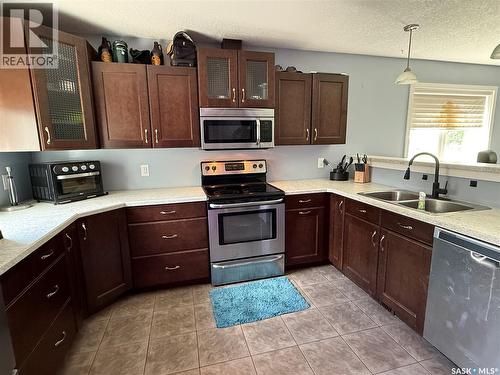 802 Park Avenue, Weyburn, SK - Indoor Photo Showing Kitchen With Double Sink