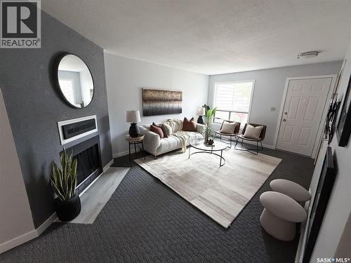 376 Cedar Meadow Drive, Regina, SK - Indoor Photo Showing Living Room With Fireplace