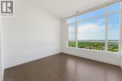 Expansive window wall with multiple panes offering abundant natural light - 