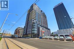 Modern high-rise residential building with a commercial ground floor - 