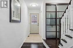 Double Closet in Bright Front Hall Entrance - 