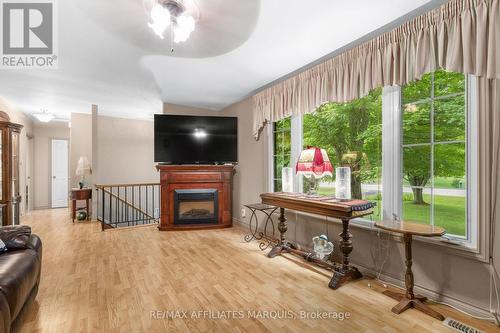 57 Golf Club Road, Rideau Lakes, ON - Indoor Photo Showing Other Room With Fireplace