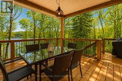 Covered Deck Overlooking the Lake - 