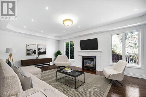 Large Family Room with Coffered Ceilings - 555 Kingsfield Loop, Oshawa, ON - Indoor Photo Showing Living Room With Fireplace