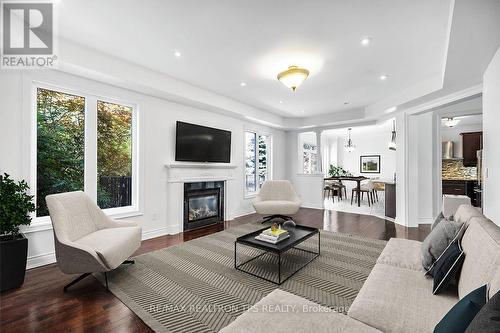 Fireplace and Hardwood Floors - 555 Kingsfield Loop, Oshawa, ON - Indoor Photo Showing Living Room With Fireplace