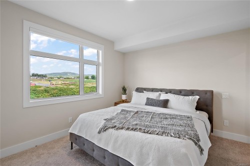 #202-2520 Hackett Cres, Central Saanich, BC - Indoor Photo Showing Bedroom