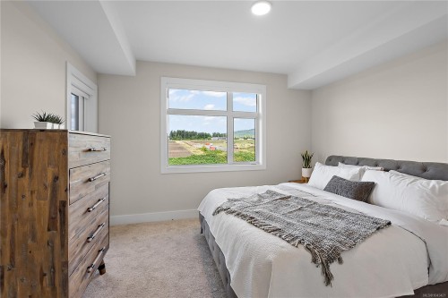 #202-2520 Hackett Cres, Central Saanich, BC - Indoor Photo Showing Bedroom