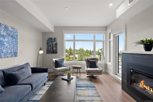 #403-2520 Hackett Cres, Central Saanich, BC - Indoor Photo Showing Living Room With Fireplace