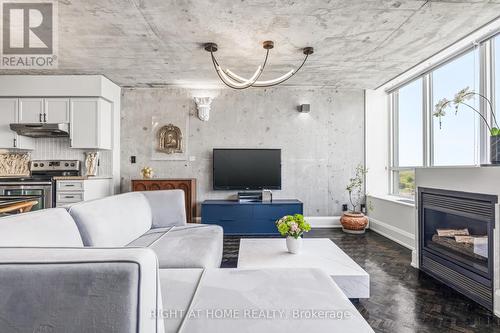 612 - 250 Manitoba Street, Toronto, ON - Indoor Photo Showing Living Room With Fireplace