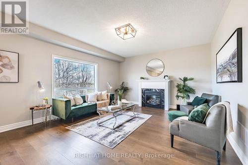 940 O'Reilly Crescent, Shelburne, ON - Indoor Photo Showing Living Room With Fireplace
