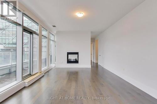 1126 - 39 Queens Quay E, Toronto, ON - Indoor Photo Showing Other Room With Fireplace