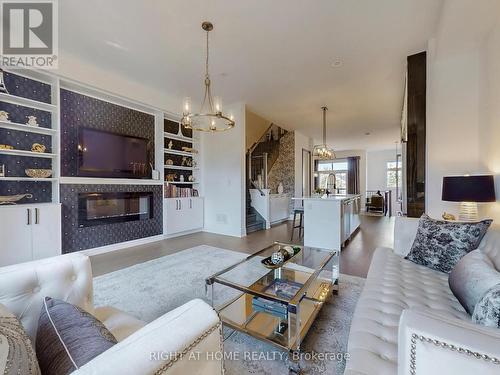 163 Lebovic Campus Drive, Vaughan, ON - Indoor Photo Showing Living Room With Fireplace