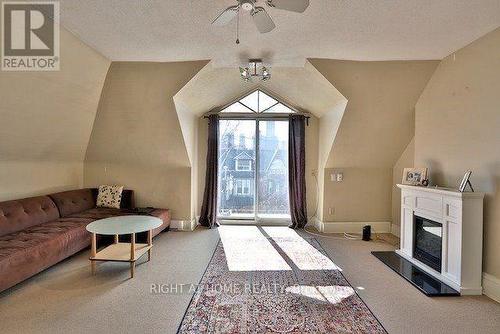 3rd Floor Living - 34 Macpherson Avenue, Toronto, ON - Indoor With Fireplace