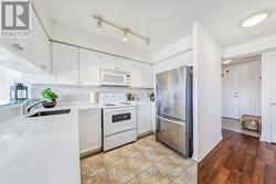 Stainless Steel Fridge In Kitchen - 
