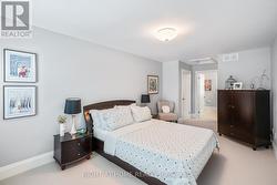 Upper Bedroom #2 w/ ensuite bath & walk-in closets - 