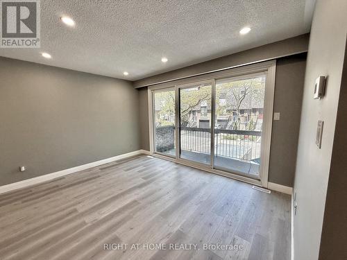 Recently Painted & New Flooring Flr-Ceiling Winds. - 24 - 7 Vale Carse Way, Toronto, ON - Indoor Photo Showing Other Room