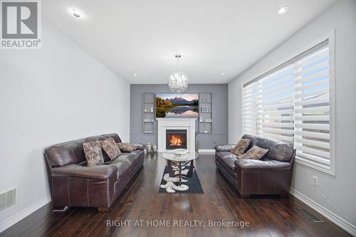 28 Marks Road, Springwater, ON - Indoor Photo Showing Living Room With Fireplace