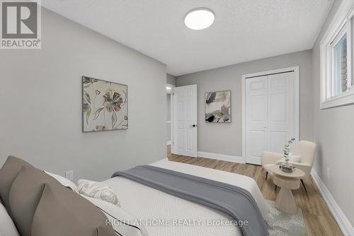 Virtually Staged - 65 Woodman Drive S, Hamilton, ON - Indoor Photo Showing Bedroom