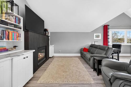 362 Short Point Road, Rideau Lakes, ON - Indoor Photo Showing Living Room With Fireplace