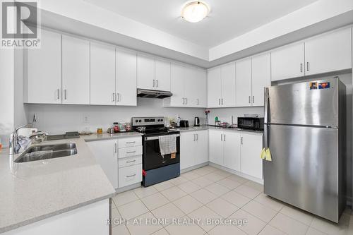 24 Monreau Drive, Brampton, ON - Indoor Photo Showing Kitchen With Double Sink