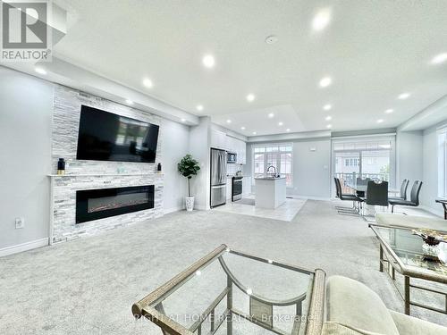 39 - 113 Hartley Avenue, Brant, ON - Indoor Photo Showing Living Room With Fireplace