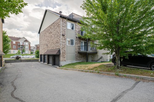 Garage - 3-6020 Boul. Chevrier, Brossard, QC - Outdoor With Balcony