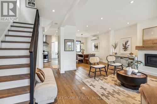 141 O'Connor Drive, Toronto, ON - Indoor Photo Showing Living Room With Fireplace