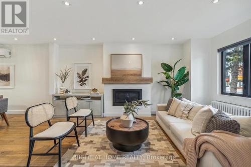 141 O'Connor Drive, Toronto, ON - Indoor Photo Showing Living Room With Fireplace