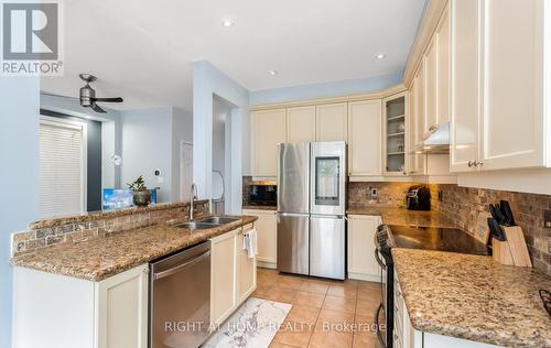 3852 Bloomington Crescent, Mississauga, ON - Indoor Photo Showing Kitchen With Stainless Steel Kitchen With Double Sink
