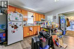 Wood-finish flooring throughout the space - 