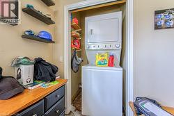 Stackable laundry appliances within a dedicated closet - 