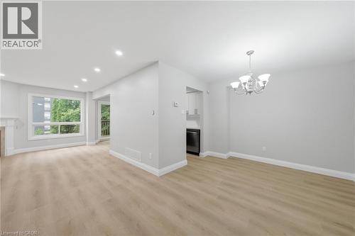 2155 Duncaster Drive Unit# 2, Burlington, ON - Indoor With Fireplace