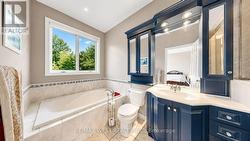 Primary Ensuite with Soaker Tub & Glass Shower - 