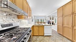 Kitchen with Ample Cabinetry & Prep Space - 