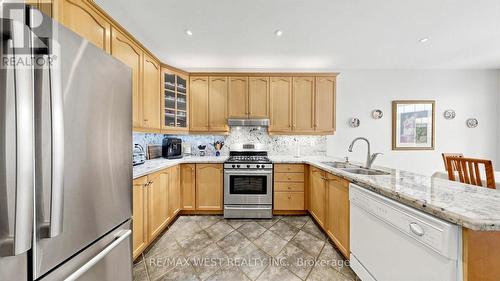Chef's Kitchen with Granite Countertops - 71 Gidleigh Park Crescent, Vaughan, ON - Indoor Photo Showing Kitchen With Double Sink