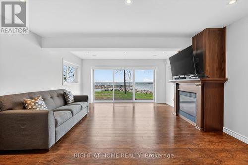 442 Silver Birch Drive, Tiny, ON - Indoor Photo Showing Living Room With Fireplace