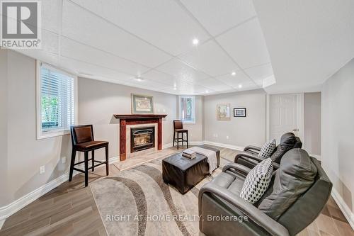 Lower-Family Room - 126 Moore Crescent, Hamilton, ON - Indoor With Fireplace