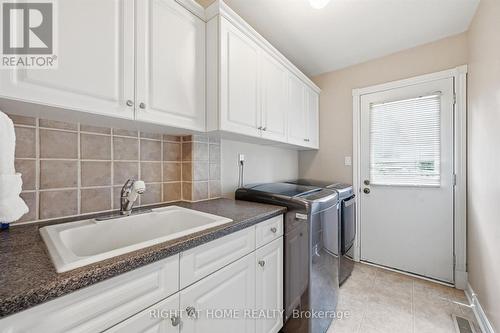 Main Floor Laundry w/ Direct Backyard Access - 1 Idared Road, Hamilton, ON - Indoor Photo Showing Laundry Room