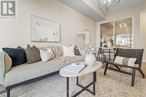 329 - 30 Shore Breeze Drive, Toronto, ON - Indoor Photo Showing Living Room