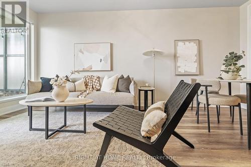 329 - 30 Shore Breeze Drive, Toronto, ON - Indoor Photo Showing Living Room